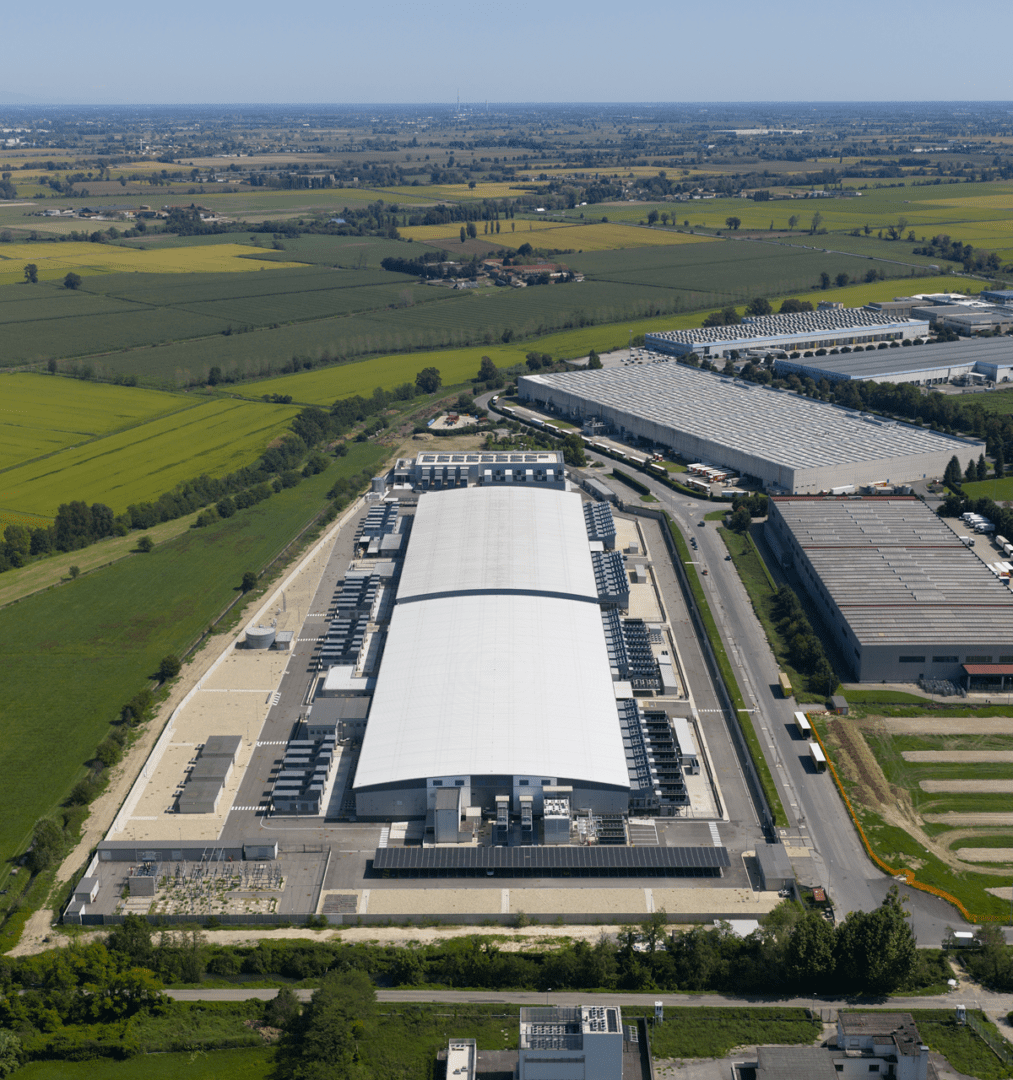 Aerial view of large industrial warehouse complex.